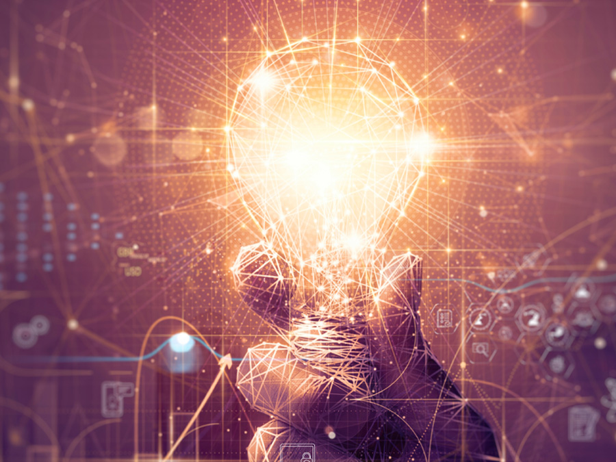 Human hand holding a lightbulb representing DARPA Ideas Under Incubation