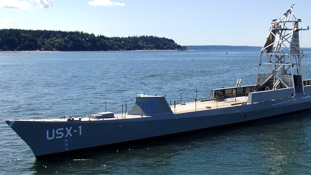 The NOMARS program demonstrator vessel, USX-1 Defiant, conducts in-water testing in the Puget Sound. 