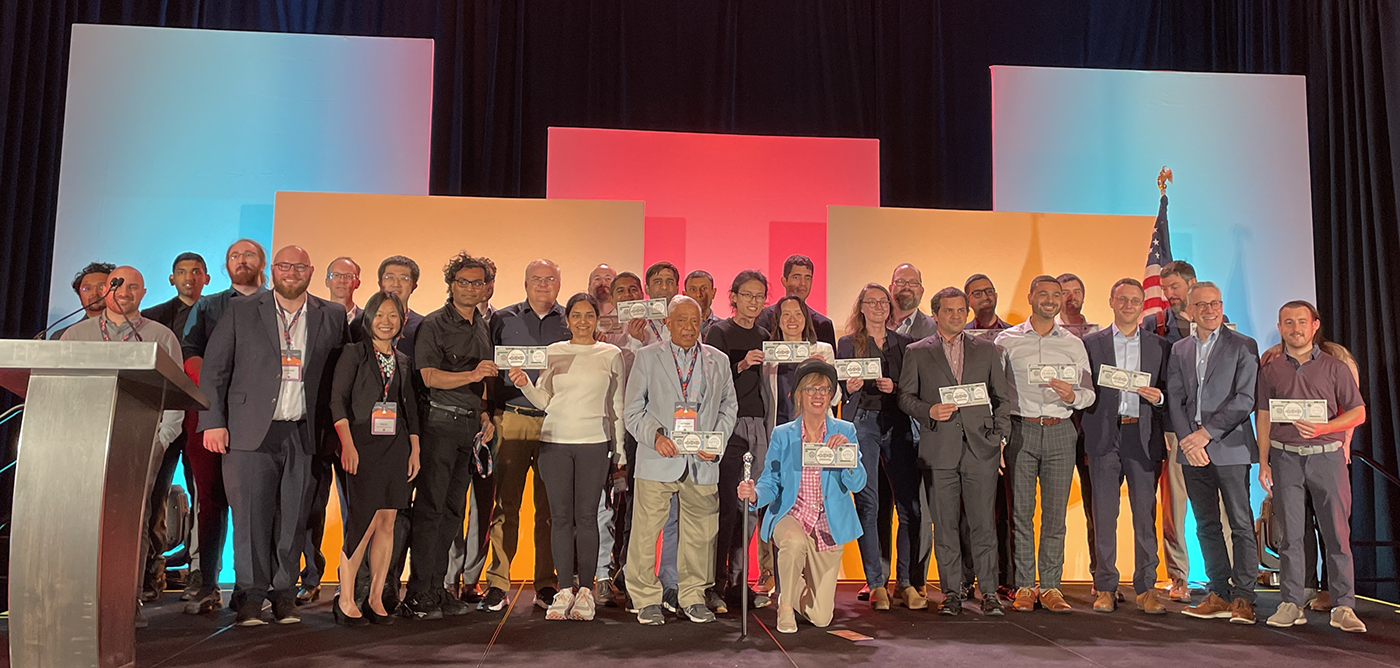 MTO Pitch Day winners standing together on stage