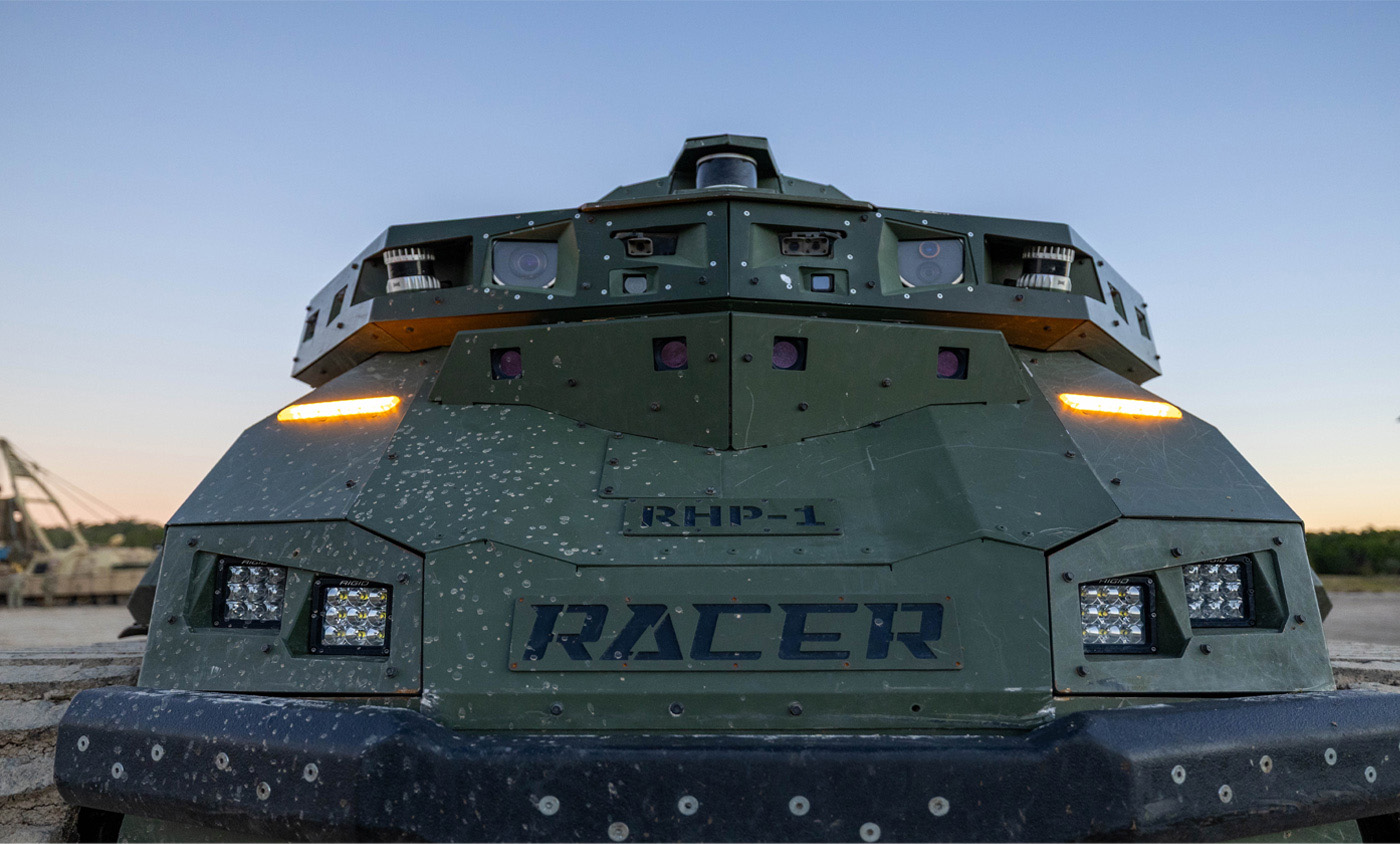 The RACER Heavy Platform (RHP) vehicles are 12-ton, 20-foot-long, skid-steer tracked vehicles – similar in size to forthcoming robotic and optionally manned combat/fighting vehicles.