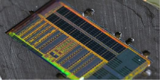 This electronic-photonic processor integrates on a single chip more than 70 million transistors and 850 photonic components that provide logic, memory, and interconnect functions. It was developed with support from several DARPA programs, among them the Photonically Optimized Embedded Microprocessors (POEM) program.