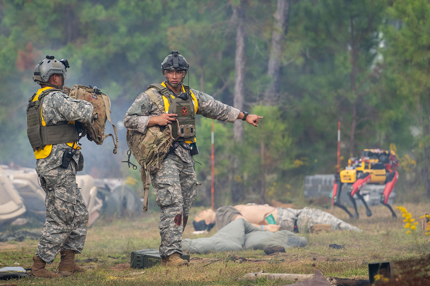 Medic teams with UGVs to assess casualties on the DARPA Triage Challenge C-130 course